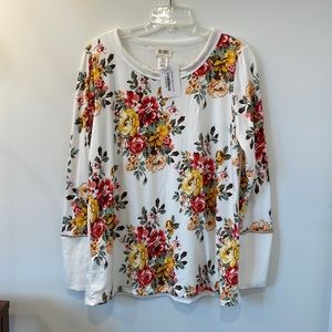 NWT. MEDIUM. floral long sleeve top.